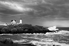 Storm Clouds Ober Nubble Lighthouse with Waves Crashing